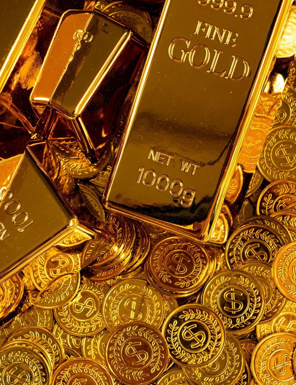 Goldbarren und Goldmünzen - Physisches Gold als Vermögensanlage